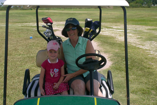 kids and golf carts